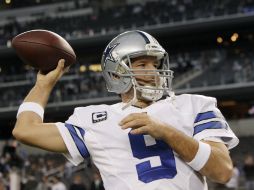 Tony Romo lanza cuatro pases de anotación y rompe el récord de la franquicia que estaba en poder de Troy Aikman. AP / B. Wade