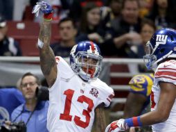 El receptor de los Gigantes, Odell Beckham Jr., impone marca para novatos en número de recepciones y supera las mil yardas. AP / C. Riedel