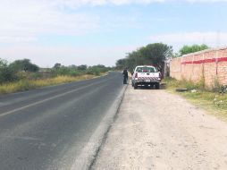 Tlajomulco. Elementos resguardan la zona en donde se encontró uno de los cuerpos. EL INFORMADOR /