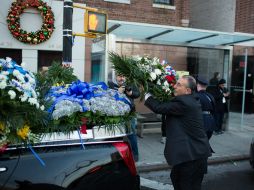 La ceremonia en memoria del agente Rafael Ramos se realiza en la Iglesia del Tabernáculo de Cristo en Queens. AFP / K. Hagen