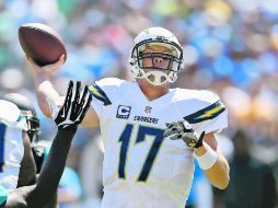 Philip Rivers y San Diego tienen el balón en su poder para avanzar a los playoffs, ya que poseen una marca de 9-6. AFP /