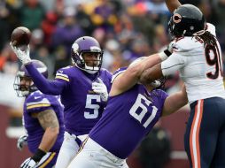 Teddy Bridgewater lanza un pase de 44 yardas en el touchdown de la ventaja a Adam Thielen en el tercer cuarto. AFP / H. Foslien