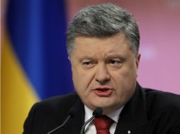 Poroshenko precisa que los ministros de Asuntos Exteriores de los cuatro países ya trabajan en la agenda y proyectos de resolución. AP / S.Chuzavkov