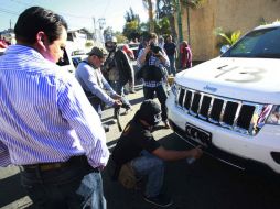 Su camioneta de lujo fue marcada con el número 43, CETEG y la consigna de 'Ayotzi VIVE'. SUN / J. Ríos