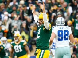 Un lesionado Aaron Rodgers lanzó tres pases de touchdown. AFP / A. Bello