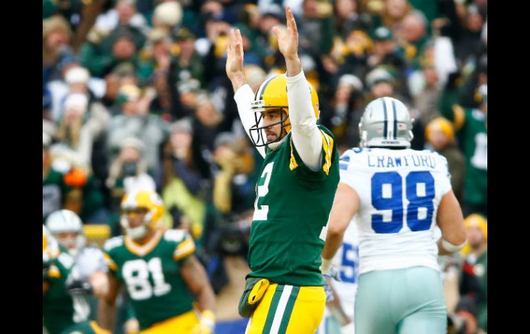 Un lesionado Aaron Rodgers lanzó tres pases de touchdown. AFP / A. Bello