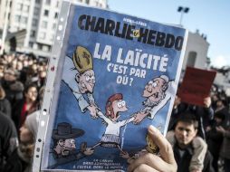 La muestra reúne ediciones originales de 'Charlie Hebdo' desde su fundación en 1992. AFP / P. Ksiazek