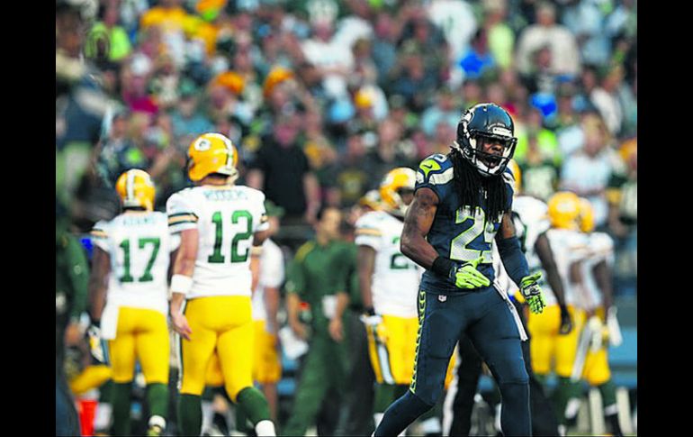 En la Semana 1, Sherman (25) neutralizó la mitad del terreno, luego de que Rodgers (12) no lanzara pase alguno en su dirección. ESPECIAL / NFL