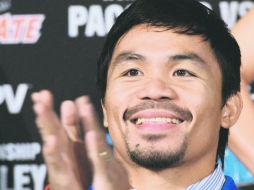 Manny Pacquiao habría aceptado ya  todas las condiciones de Floyd Mayweather para pelear el 2 de mayo próximo. AFP / J. Klamar