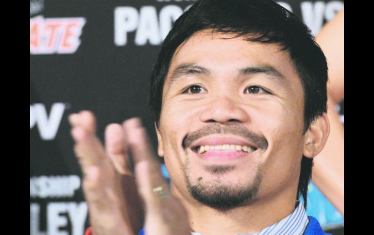 Manny Pacquiao habría aceptado ya  todas las condiciones de Floyd Mayweather para pelear el 2 de mayo próximo. AFP / J. Klamar