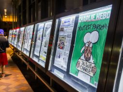 La portada del último número de 'Charlie Hebdo' tiene en su portada una caricatura de Mahoma con un letrero de 'Je Suis Charlie'. EFE / ARCHIVO