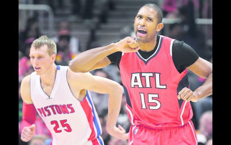 Intenso. El dominicano Al Horford de los Hawks de Atlanta festeja uno de los 14 puntos que anotó anoche. AFP /