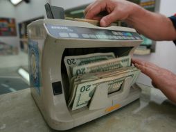 El mínimo de compra del dólar fue de 14.22 pesos. EL INFORMADOR / ARCHIVO