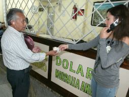 El dolar se ubica en 14.90 pesos a la venta y 14.05 pesos a la compra. EL INFORMADOR / ARCHIVO