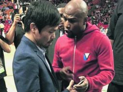 Se conoce la afición de Pacquiao (izq.) por el basquetbol. Mayweather ha asistido a varios juegos de Miami. ESPECIAL /