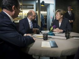 Alemania estaría dispuesta a apoyar un nuevo programa de ayuda de hasta 20 mil MDE, siempre que Tsipras cumpliera con la Troika. EFE / G. Bergman