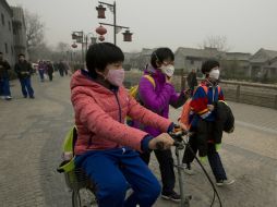 La tasa de mortalidad derivada de la contaminación es menor en Beijing, que en 21 de las 31 urbes estudiadas. AP / ARCHIVO