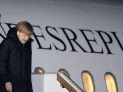 Merkel llega a Moscú procedente de Alemania, adonde había regresado anoche después de visitar Kiev. AFP / A. Nemenov