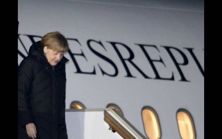 Merkel llega a Moscú procedente de Alemania, adonde había regresado anoche después de visitar Kiev. AFP / A. Nemenov