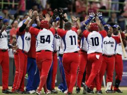 Cuba vence este sábado en semifinales por 8-4 a los Caribes de Anzoátegui de Venezuela. AP / R. Arduengo