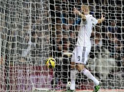 En el minuto 72, un servicio corto de Ronaldo para Benzema, le dan el 2-0 al Real Madrid. AFP / J. Soriano