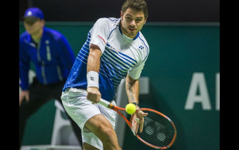 Stan Wawrinka logra su victoria individual número 350 ante el segundo favorito del torneo, Raonic. AP / P. Post