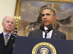 Barack Obama y el vicepresidente Joe Biden hablan en la Casa Blanca sobre los ataques del Estado Islámico. AP / ARCHIVO