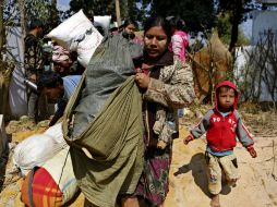 Los enfrentamientos con rebeldes obligan a miles de civiles a huir de la región de Kokang. EFE / L. Bo Bo