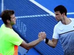 Harrison (i) y Dimitrov (d) se estrechan las manos luego del partido que eliminó al búlgaro con marcadores de 7-5, 4-6 y 6-0 . NTX / J. Pazos