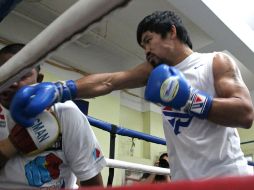 A diferencia de Mayweather, Pacquiao ya empezó sus entrenamientos para el combate del 2 de mayo. AFP / J.Agcaoli