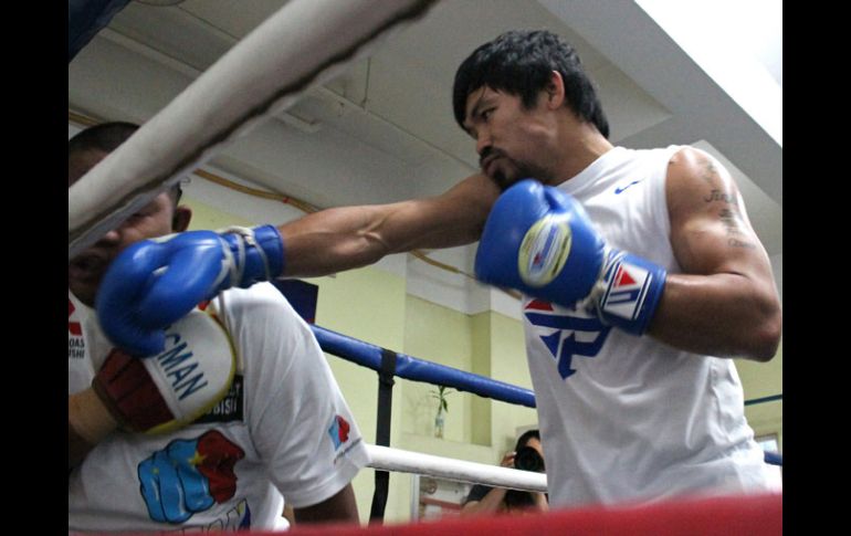 A diferencia de Mayweather, Pacquiao ya empezó sus entrenamientos para el combate del 2 de mayo. AFP / J.Agcaoli