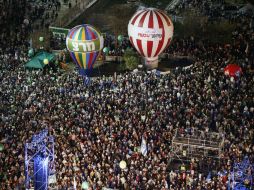 Israelíes reunidos en la Plaza Rabin, en Tel Aviv, piden un cambio en la política de Gobierno; el 17 de marzo van a las urnas. AFP / J. Guez