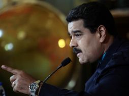 Maduro citó al líder cubano Fidel Castro y al guerrillero argentino Ernesto Che Guevara para señalar que 'no se puede creer a EU'. AFP /