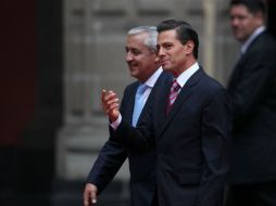 Enrique Peña Nieto resalta que con Pérez Molina acordaron desarrollar proyectos de generación eléctrica. AP / ARCHIVO