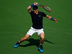 Estimulado desde las gradas por su nueva entrenadora, la ex estrella Amelie Mauresmo, el escocés reaccionó para quebrar a su rival. AFP / J. Finney