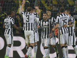 El Juventus se adelantó en el minuto 3, con un remate desde la distancia del argentino Carlos Tévez. AP / M. Meissner