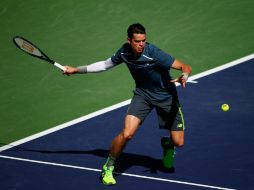 El gigantón canadiense (1.96 m) sacó mejor provecho de su potente saque y con 'bombazos' descolocó a Nadal. AFP /  J. Finney