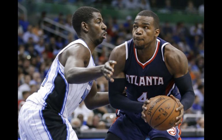 Paul Millsap (4) totalizó 25 puntos y 11 rebotes. AP / J. Raoux