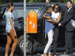 El presidente, su esposa, Michelle, y sus hijas Sasha y Malia, asistieron a la iglesia bautista. EFE / ARCHIVO