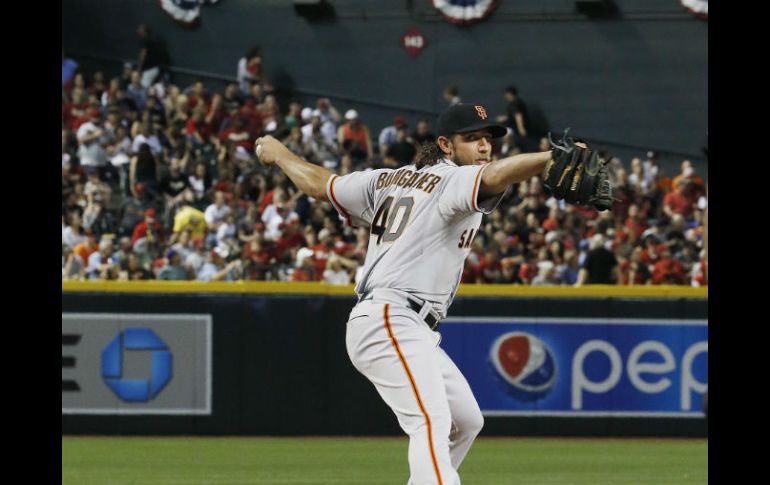 Madison Bumgarner, abridor de los Gigantes, se anotó la victoria. AP / R. Franklin