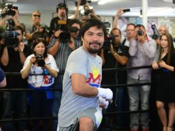 El 'Pacman' Pacquiao llega a esta pelea, a sus 35 años, con marca de 57-5-2 (38 por la vía rápida). AFP / F. Brown