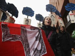 Aproximadamente 10 familiares de los normalistas que han viajado a EU participará en varias protestas en Nueva York. AFP / ARCHIVO