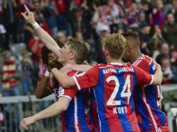 Bastian Schweinsteiger (izquierda) anotó el gol del partido 10 minutos antes del silbatazo final. AFP / G. Schiffmann