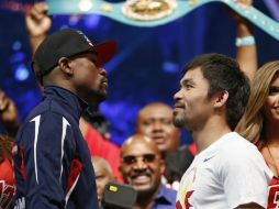 En el tercer frente a frente, Pacquiao se mostró más relajado y le sonrió a Floyd, quien tuvo una mirada penetrante. AP / J. Locher