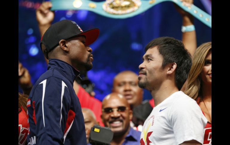 En el tercer frente a frente, Pacquiao se mostró más relajado y le sonrió a Floyd, quien tuvo una mirada penetrante. AP / J. Locher