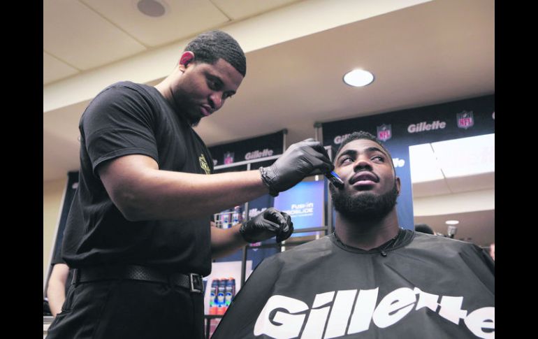 Le hacen la barba. Landon Collins fue seleccionado por los Giants de New York. AP /