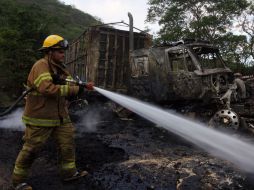 loqueos en las vías de comunicación e incendios de vehículos afectaron a la ciudad y otros municipios del Estado. AFP / H. Guerrero