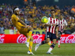 Acción del partido disputado este sábado entre Tigres vs Chivas. MEXSPORT / E. de la Torre