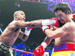 El boxeador estadounidense Floyd Mayweather Jr. se llevó la 'Pelea del Siglo'. AP /