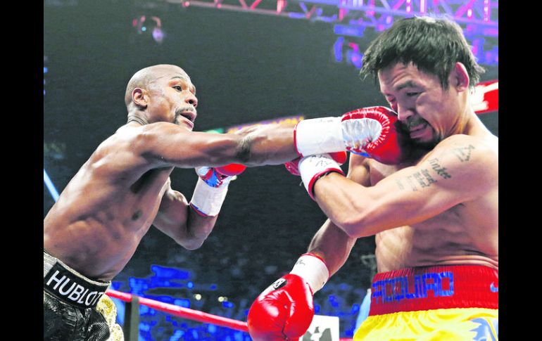 El boxeador estadounidense Floyd Mayweather Jr. se llevó la 'Pelea del Siglo'. AP /